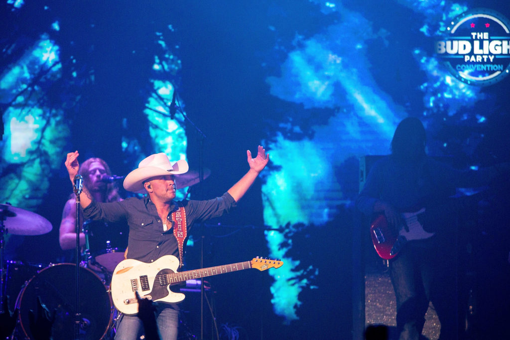 ROSEMONT, IL - AUGUST 25: Justin Moore takes the stage at the Bud Light Party Convention - Chicago at Joe's Live Rosemont on August 25, 2016 in Rosemont, Illinois. Bud Light - America's most popular and inclusive beer brand - is taking the Bud Light Party on the road with 13-city Convention Tour from 8/5-8/27. (Photo by Jeff Schear/Getty Images for Bud Light)
